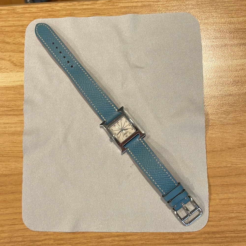 Authentic Vintage Hermes Heure H Watch. Stainless Steel with blue leather band.